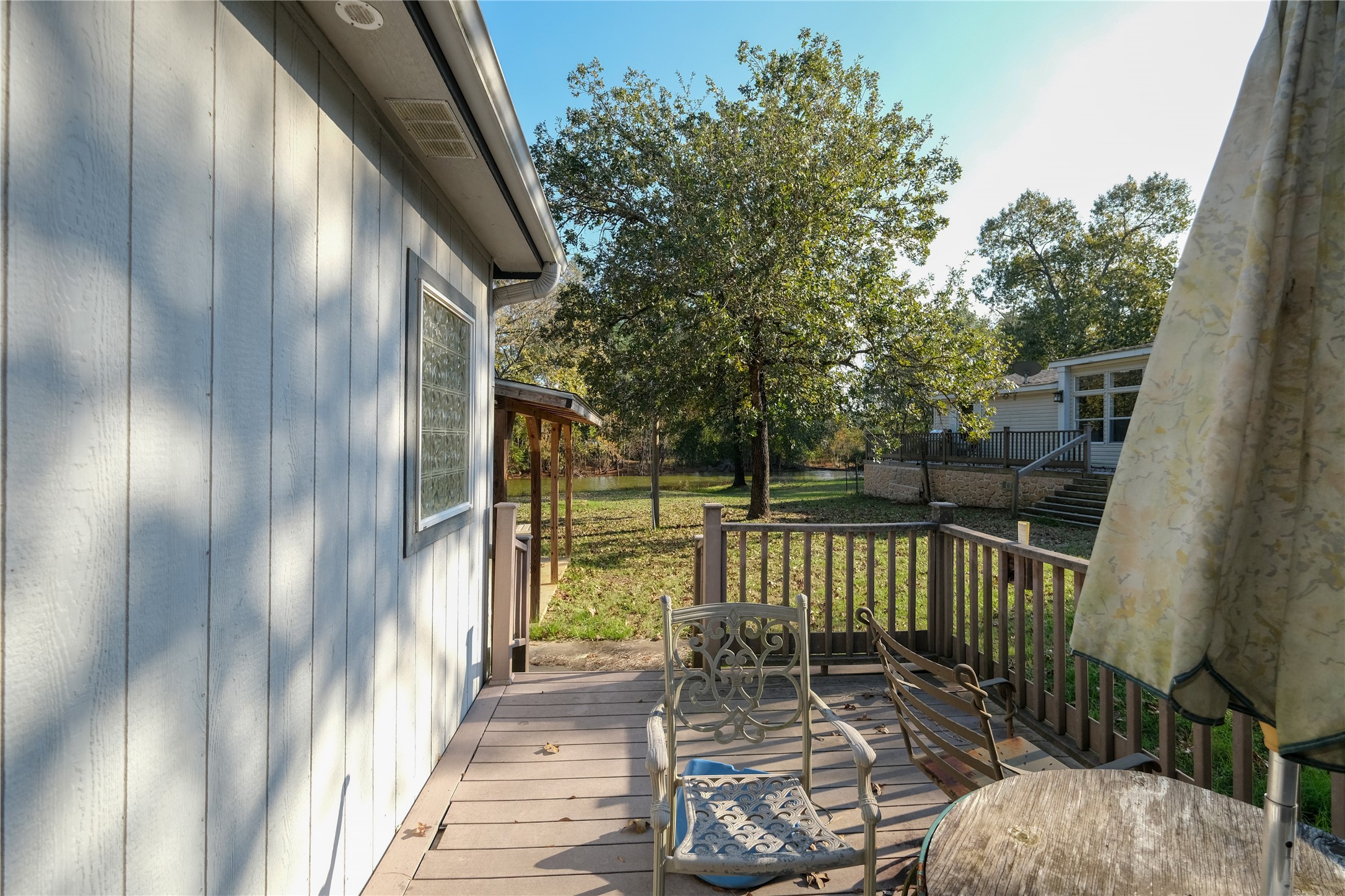 174 W Creek Trinity, TX 75862 - Photo 45 of 49 a view of balcony with wooden floor