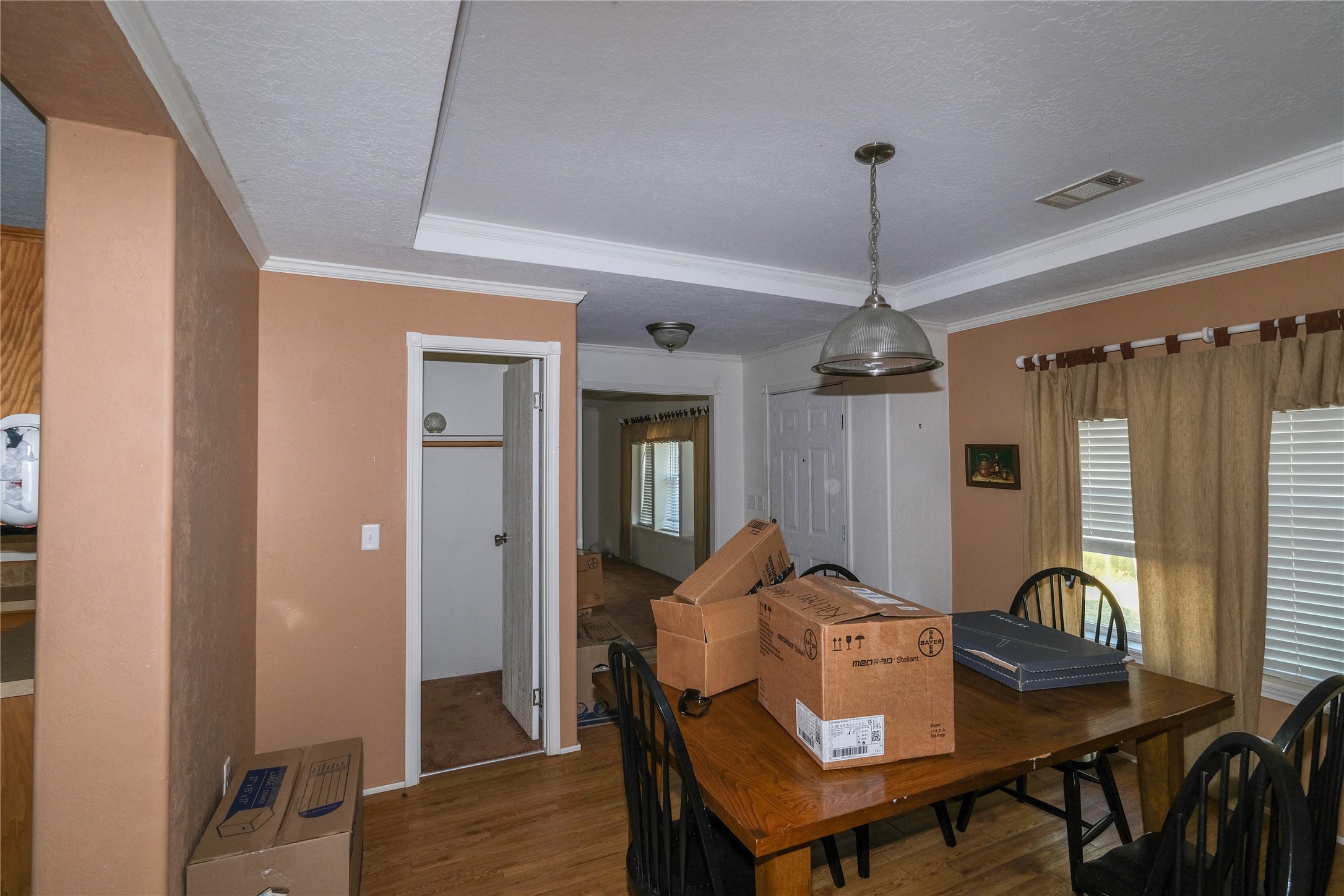 174 W Creek Trinity, TX 75862 - Photo 10 of 49 a view of a dining room with furniture window and wooden floor