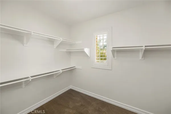 a view of an empty walk in closet
