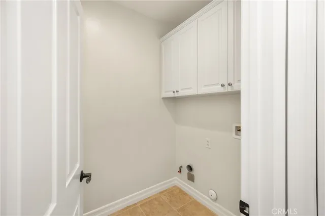 a view of a livingroom with a ceiling fan and window