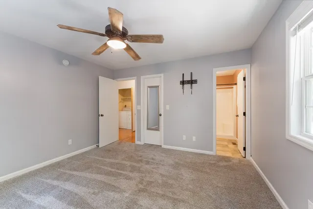 a view of hallway with shower