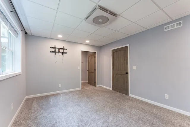 a view of a room with racks on the wall