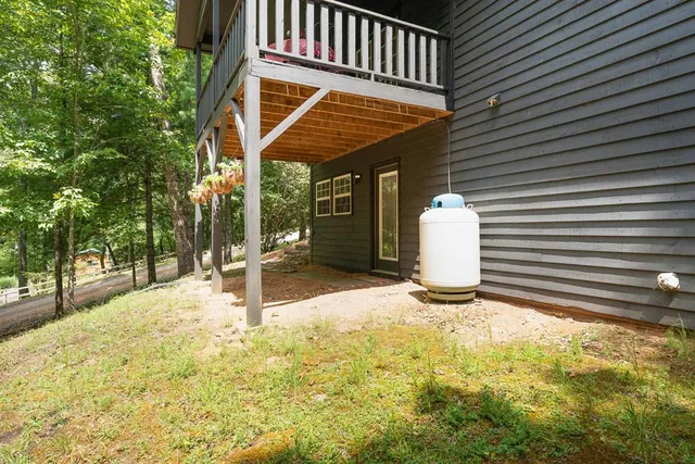 a view of a trees with a yard