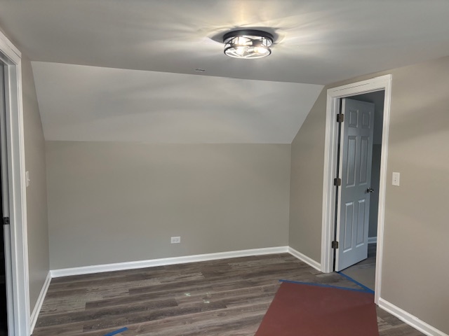 456 Franklin Boulevard Elgin, IL 60120 - Photo 19 of 32 an empty room with wooden floor and windows
