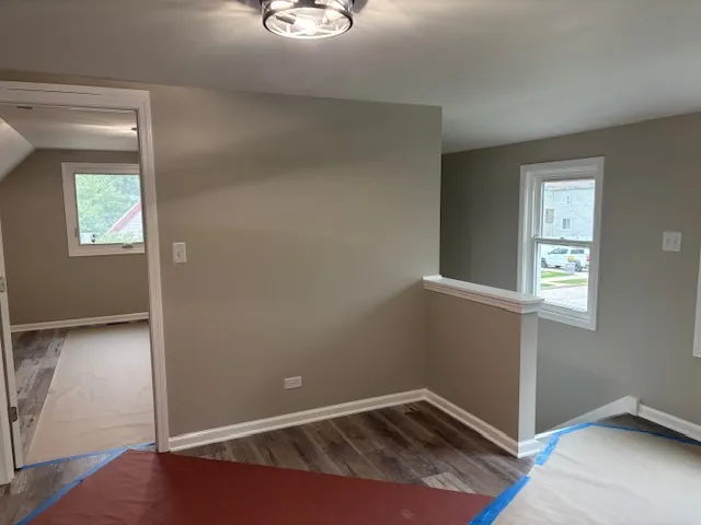 an empty room with windows