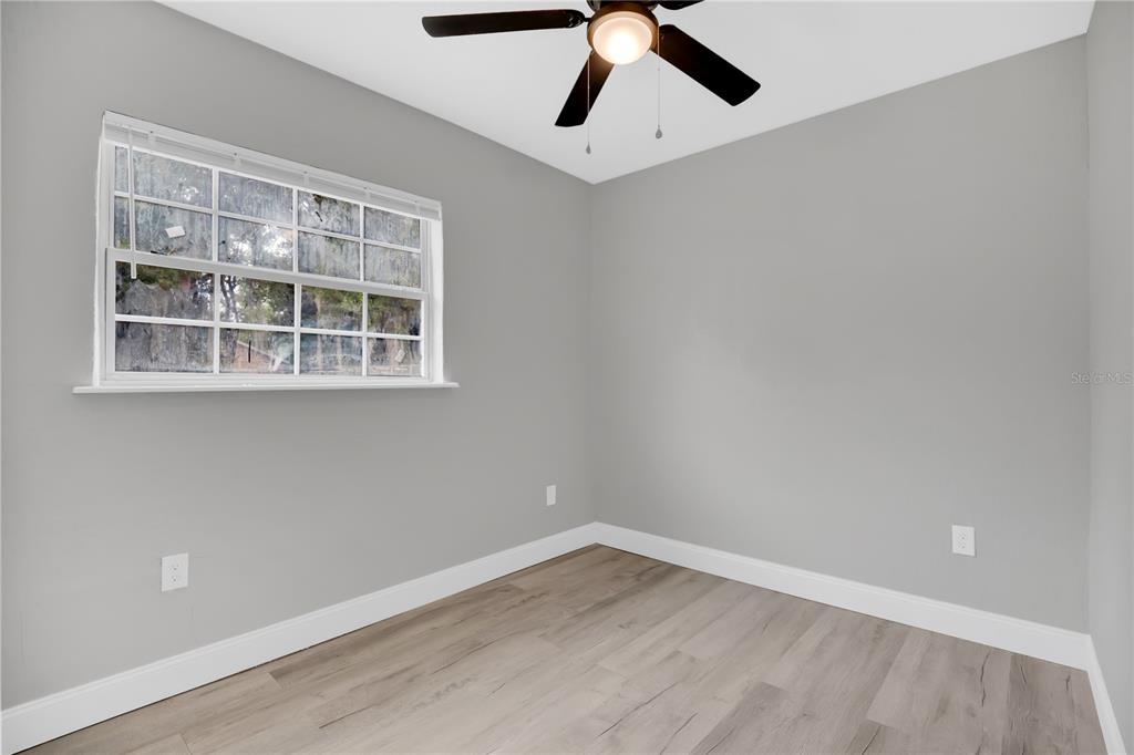 911 Indiana Street Orlando, FL 32805 - Photo 11 of 24 an empty room with a window
