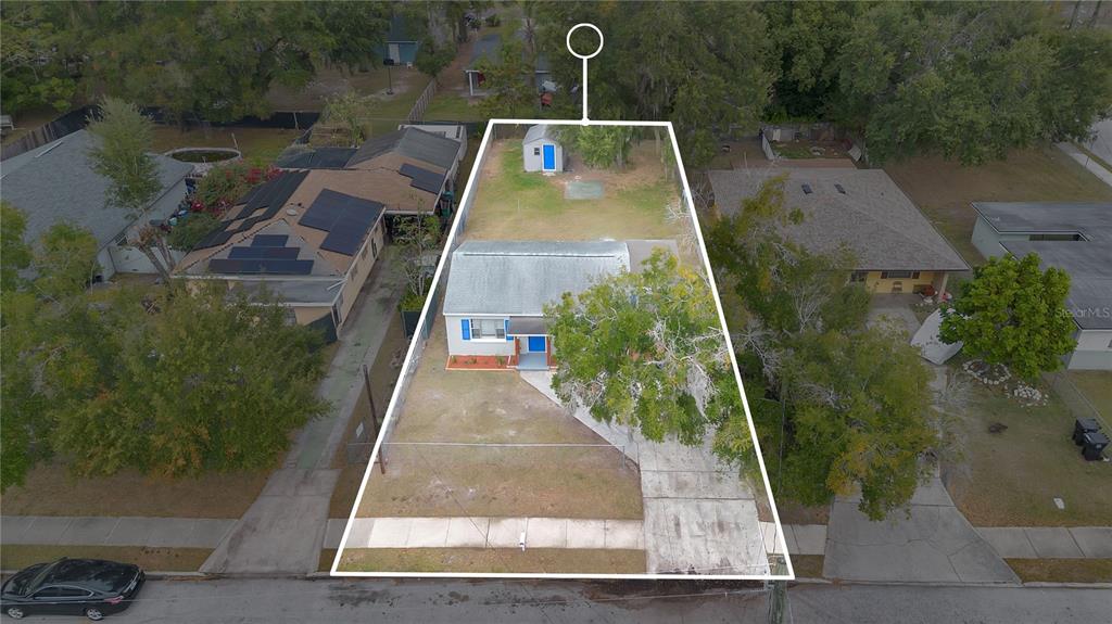 911 Indiana Street Orlando, FL 32805 - Photo 23 of 24 an aerial view of a house with a yard