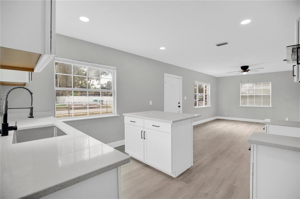 911 Indiana Street Orlando, FL 32805 - Photo 6 of 24 a view of a kitchen sink and a window