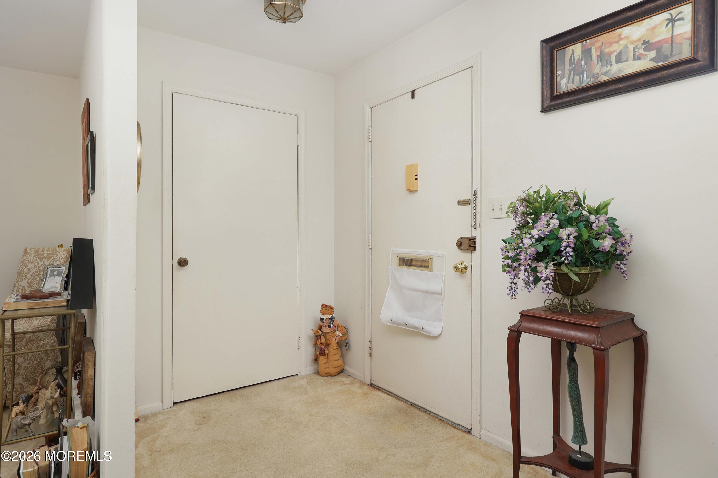 136 Rigi Strasse, Unit C Freehold, NJ 07728 - Photo 7 of 25 Foyer with Large Closet