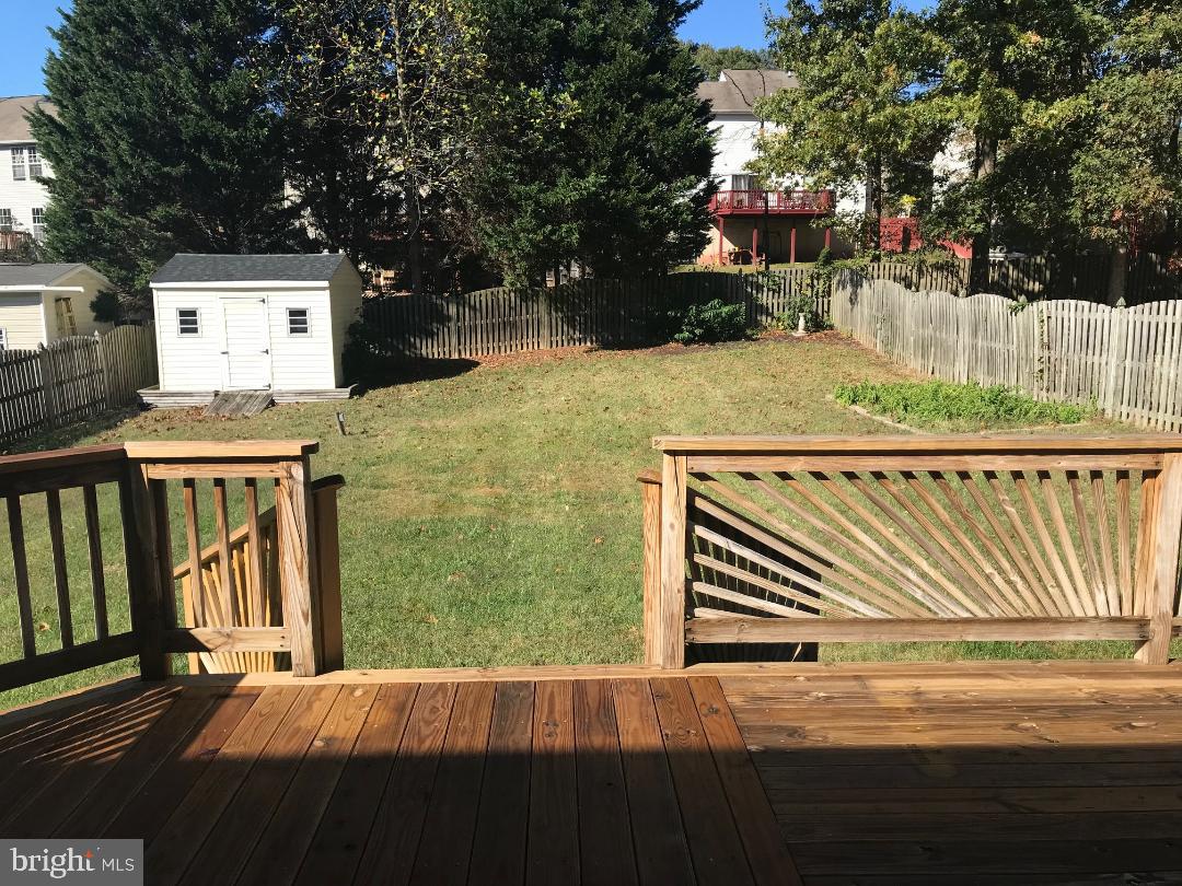 1008 Mariner Road Joppa, MD 21085 - Photo 22 of 26 Fenced yard, with deck