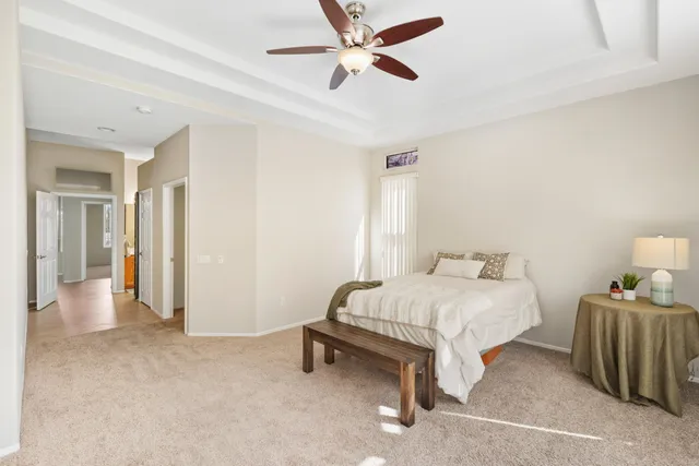a bathroom with a double vanity sink mirror and shower