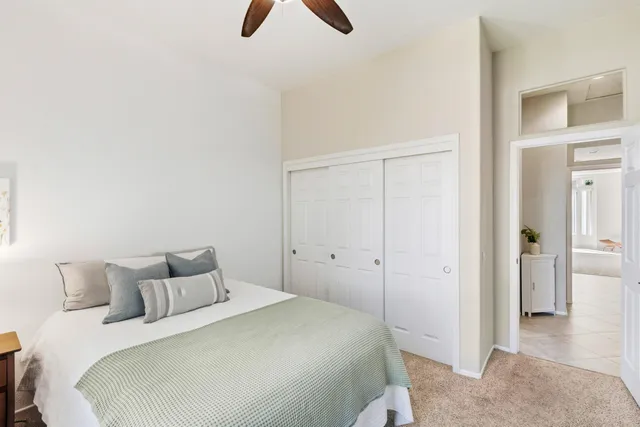 a bathroom with a sink double vanity and a mirror