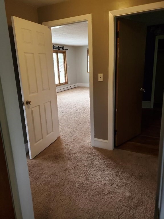 107 Davis Road Westport, MA 02790 - Photo 15 of 26 an empty room with windows and closet