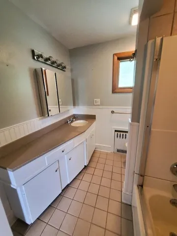 a utility room with washer and dryer