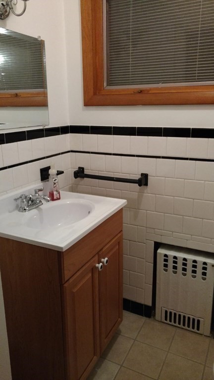 107 Davis Road Westport, MA 02790 - Photo 21 of 26 a utility room with washer and dryer