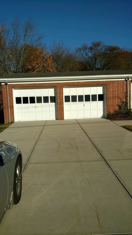 107 Davis Road Westport, MA 02790 - Photo 25 of 26 a view of a house with a barbeque