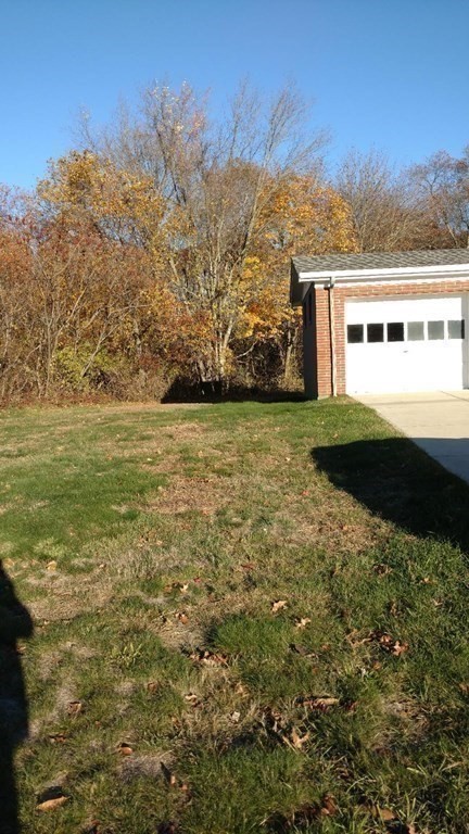 107 Davis Road Westport, MA 02790 - Photo 26 of 26 a view of a big yard with an empty space