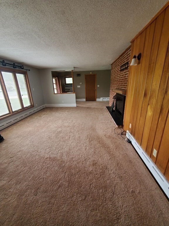 107 Davis Road Westport, MA 02790 - Photo 7 of 26 a view of a livingroom with a staircase