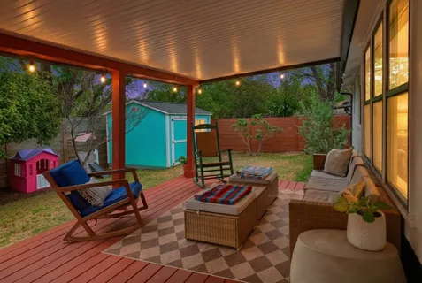 a building outdoor space with patio furniture