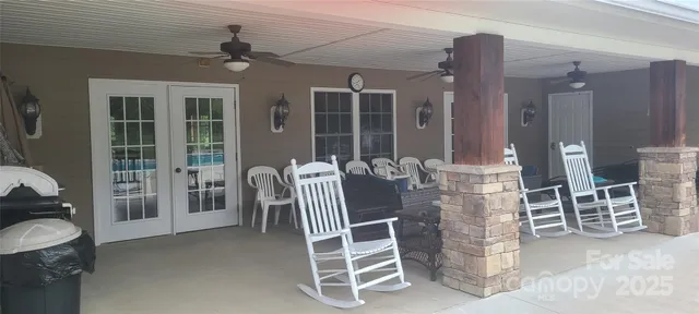 a view of a swimming pool and a yard