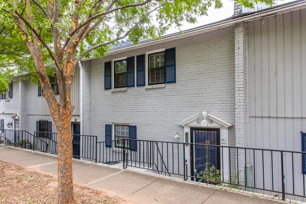 408 Sycamore Drive, Unit C Decatur, GA 30030 - Photo 1 of 1 a view of a house with a small yard next to a house