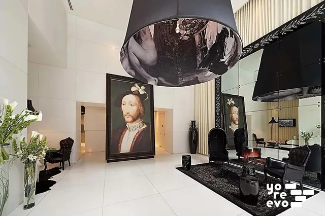 a bathroom with a toilet a sink and shower