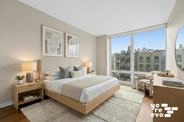 a kitchen with stainless steel appliances a sink stove and cabinets