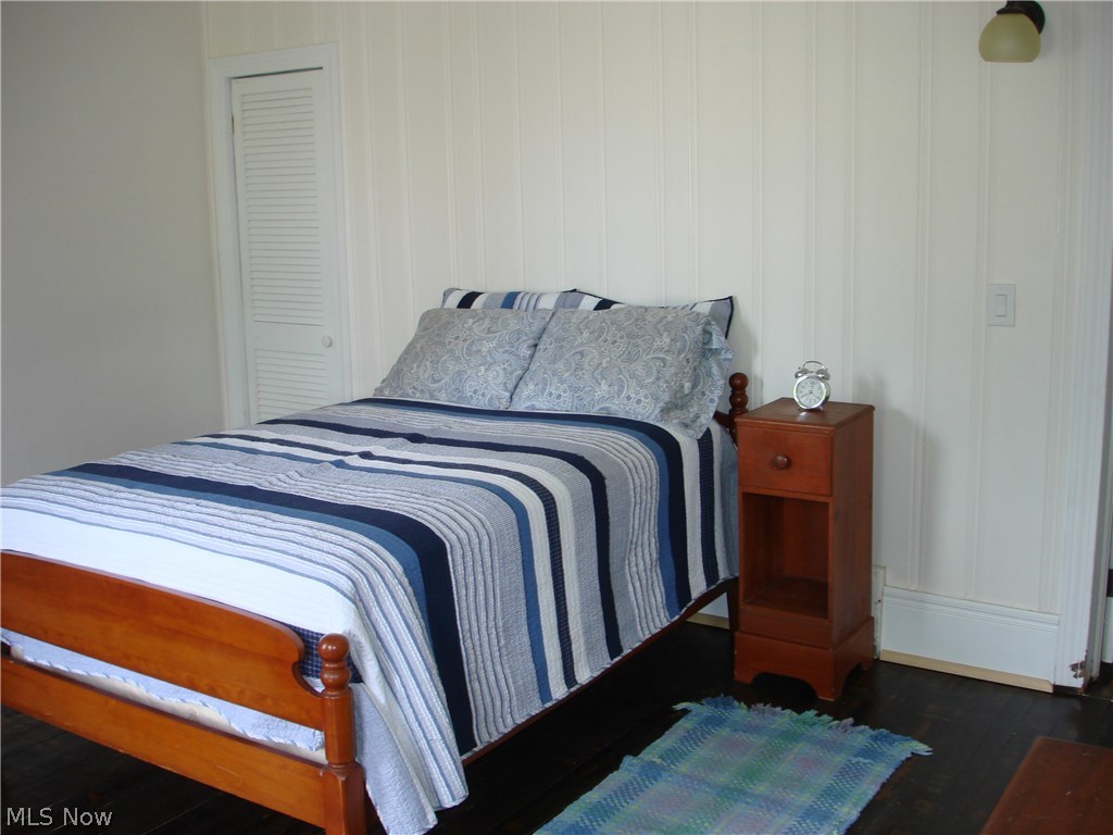 919 Richmond Road Cleveland, OH 44124 - Photo 30 of 35 2nd bedroom upstairs has refinished wood floors and vintage walls that have been freshly painted.