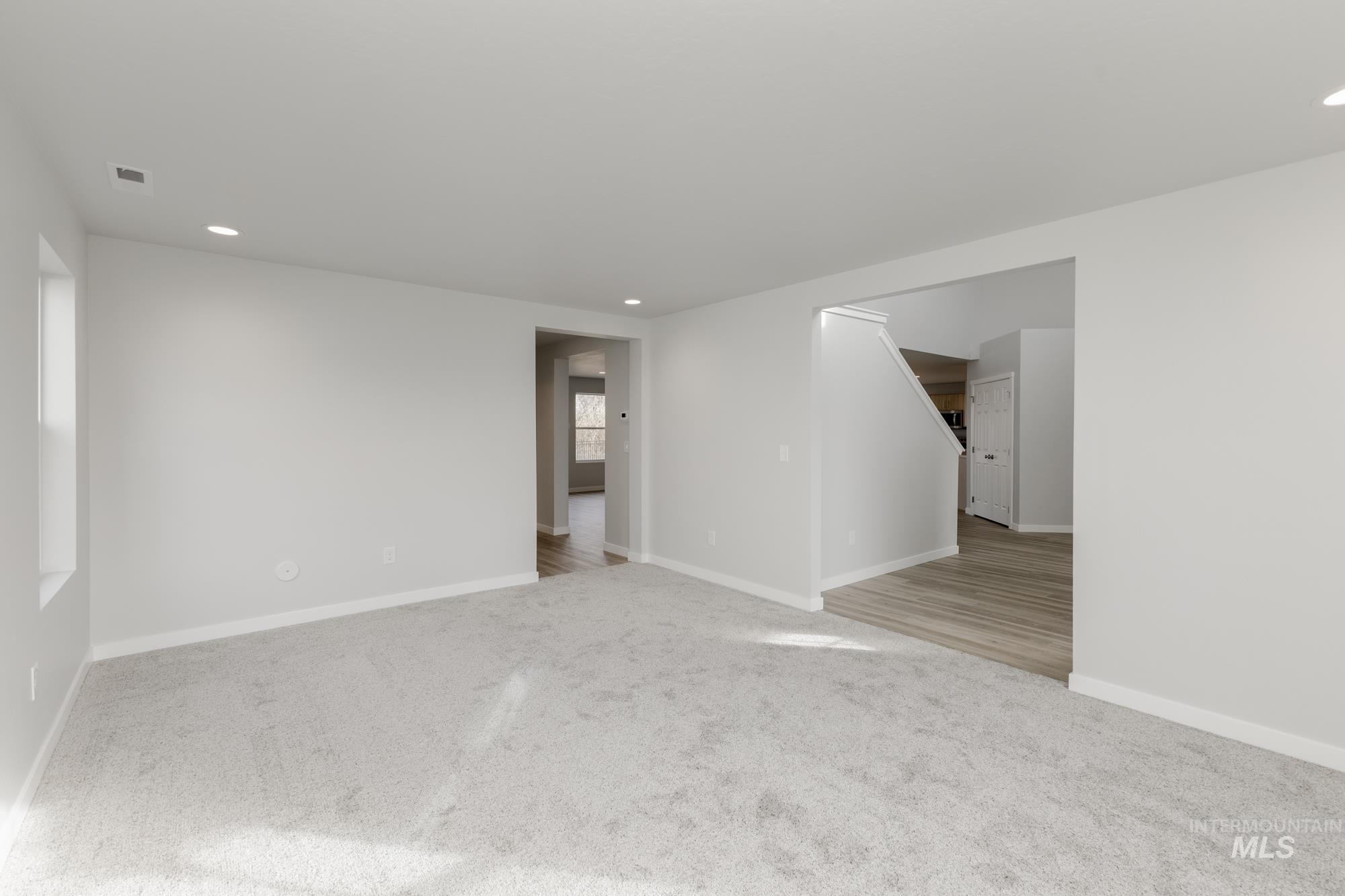 13683 Higley Court Caldwell, ID 83607 - Photo 15 of 31 Spare room with light colored carpet and recessed lighting