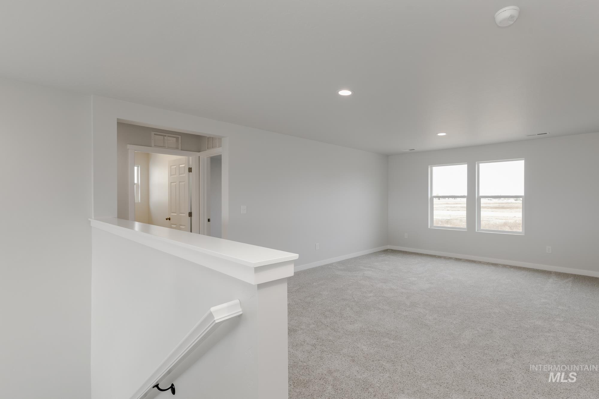 13683 Higley Court Caldwell, ID 83607 - Photo 20 of 31 Spare room featuring light carpet and recessed lighting