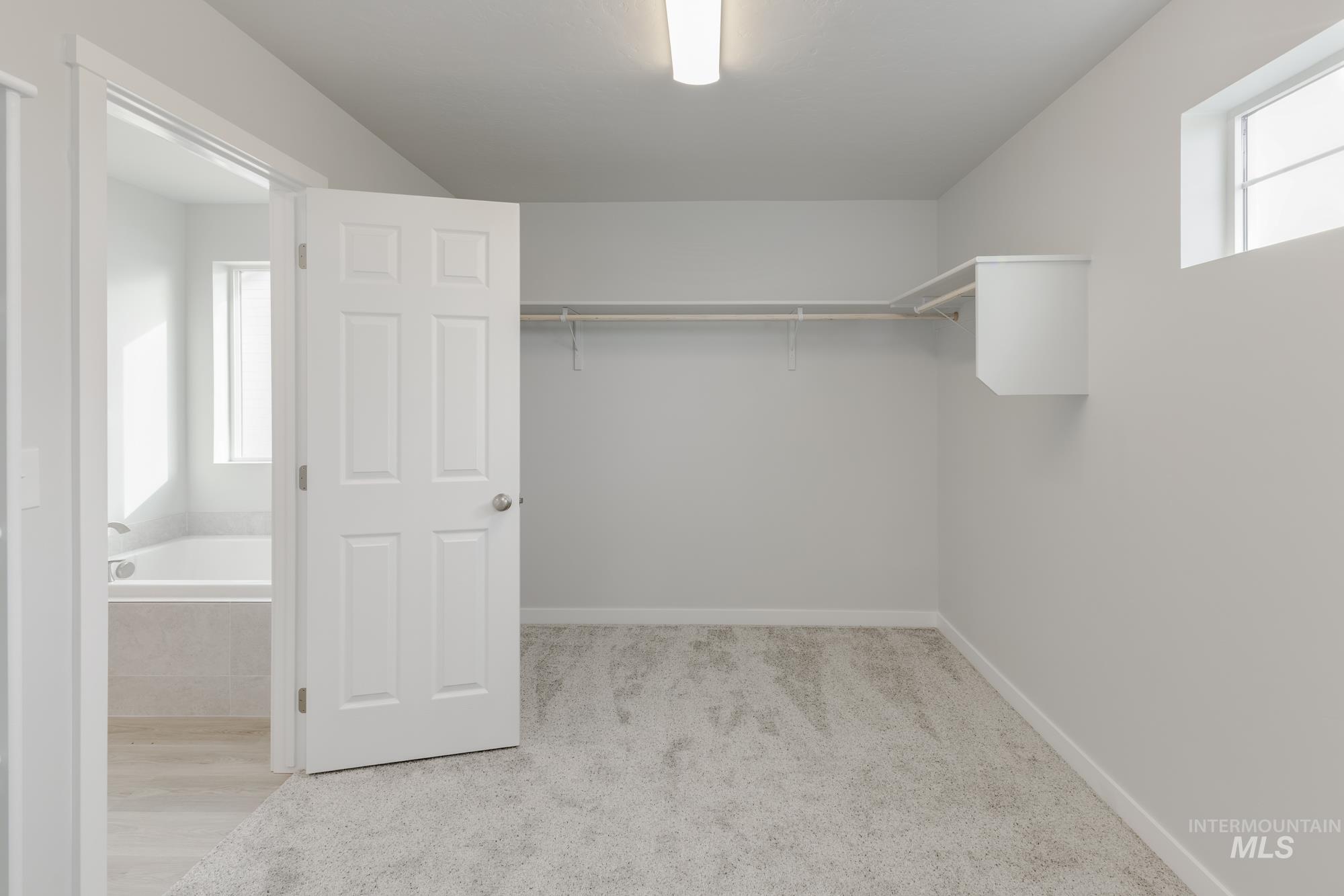13683 Higley Court Caldwell, ID 83607 - Photo 31 of 31 Spacious closet with light colored carpet