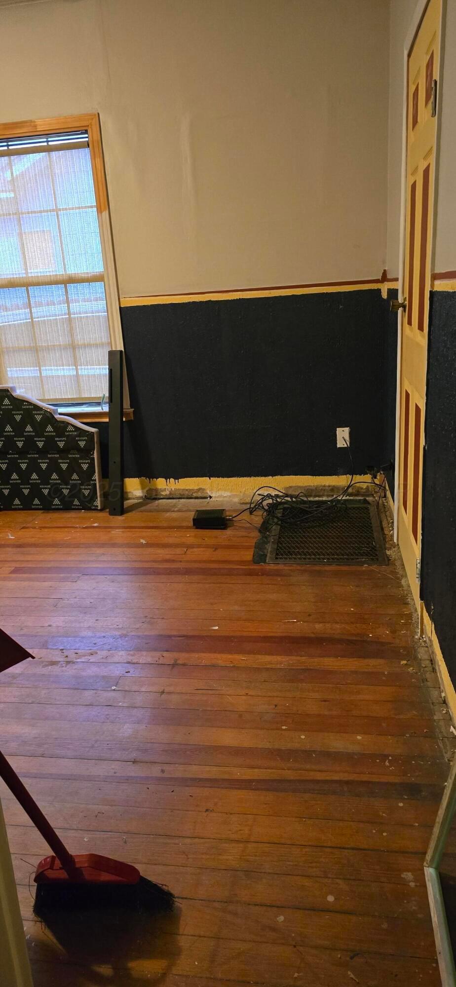 2115 Hemlock Street Borger, TX 79007 - Photo 28 of 43 a view of an empty room with a fireplace