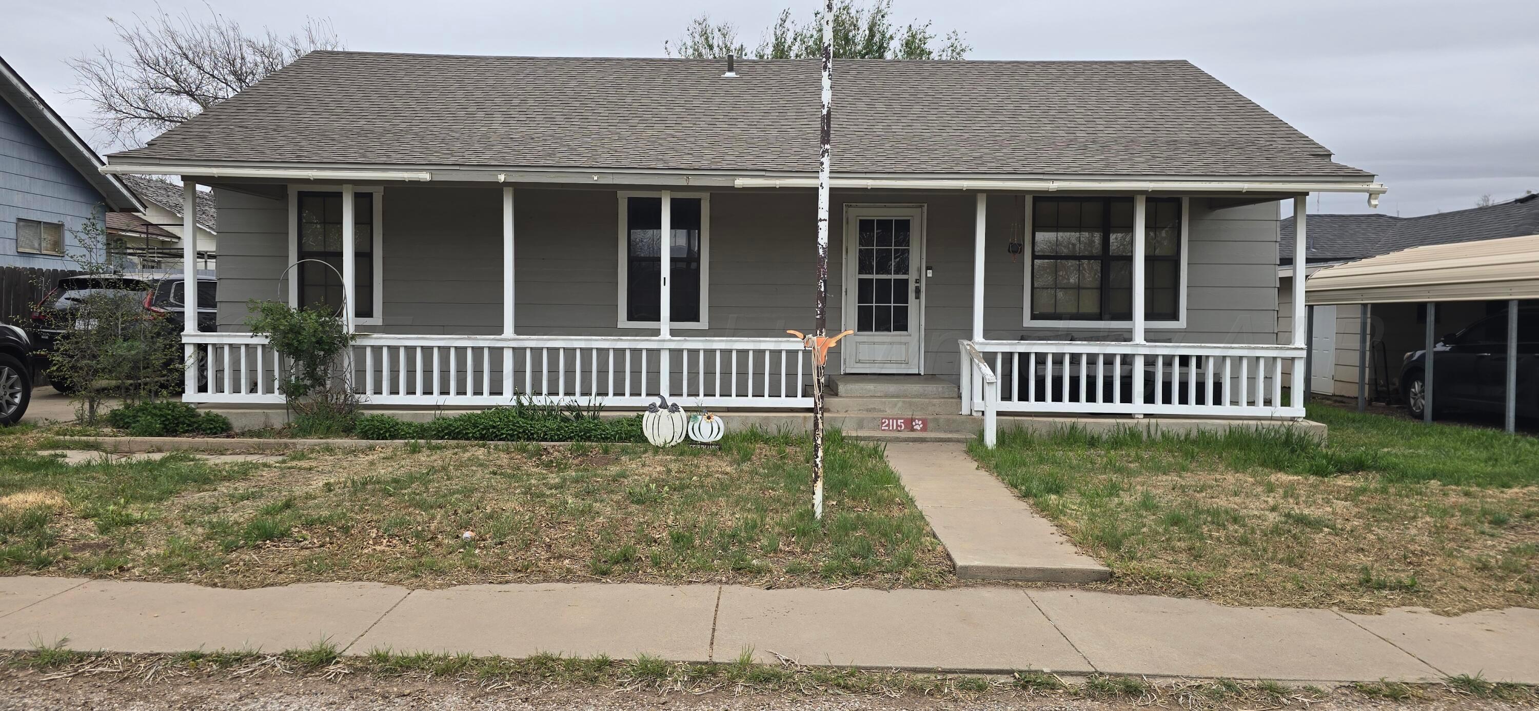 2115 Hemlock Street Borger, TX 79007 - Photo 3 of 43 a front view of a house with a yard