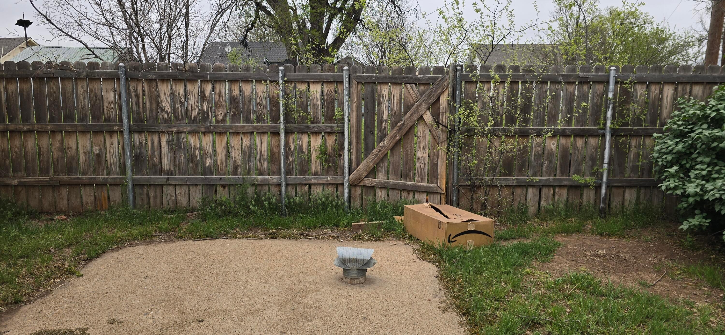 2115 Hemlock Street Borger, TX 79007 - Photo 40 of 43 a garden view with a swimming pool
