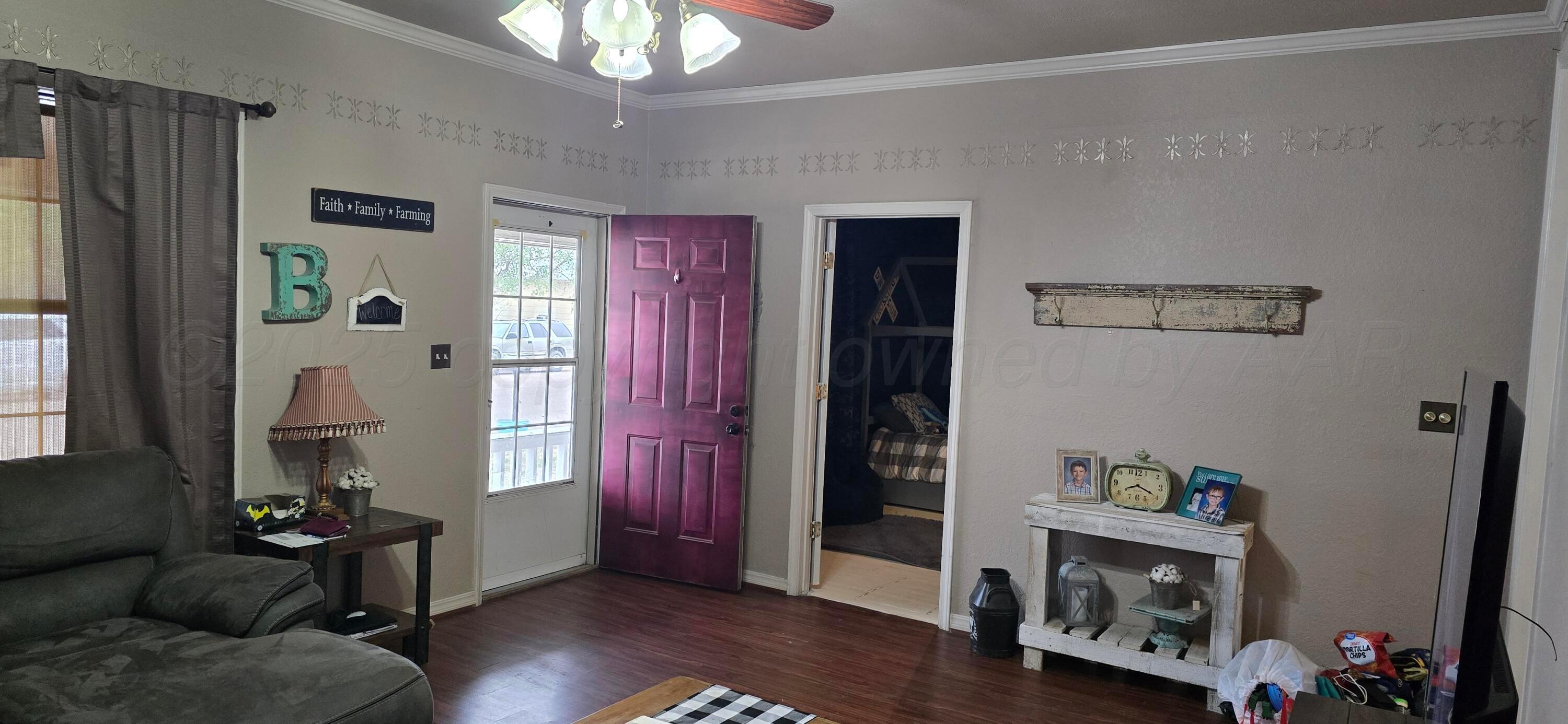 2115 Hemlock Street Borger, TX 79007 - Photo 5 of 43 a living room with furniture and a window