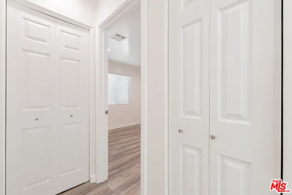 a view of a bathroom from the hallway