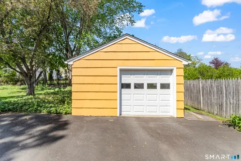 a front view of a house with a garage