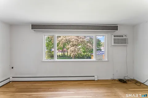 a view of a room that has a window