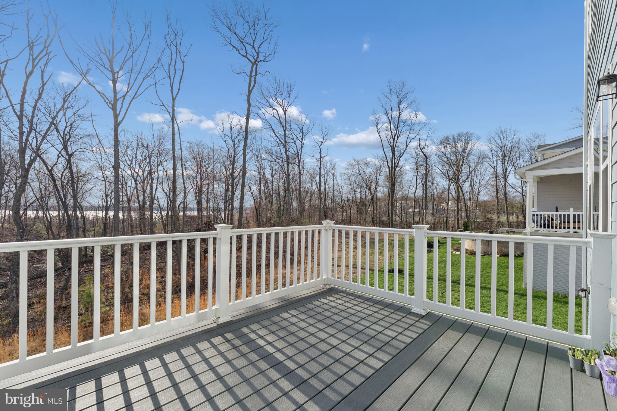 18320 Moss Garden Road Dumfries, VA 22026 - Photo 36 of 50 a view of a wooden roof deck