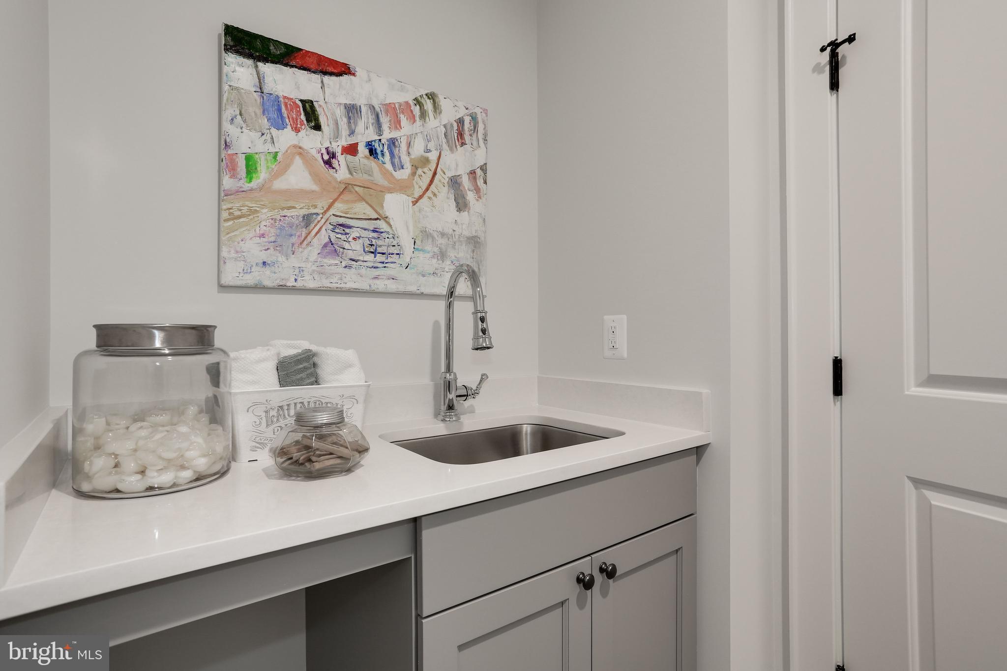 5010 25th Road North Arlington, VA 22207 - Photo 39 of 51 laundry sink and storage in upstairs laundry room