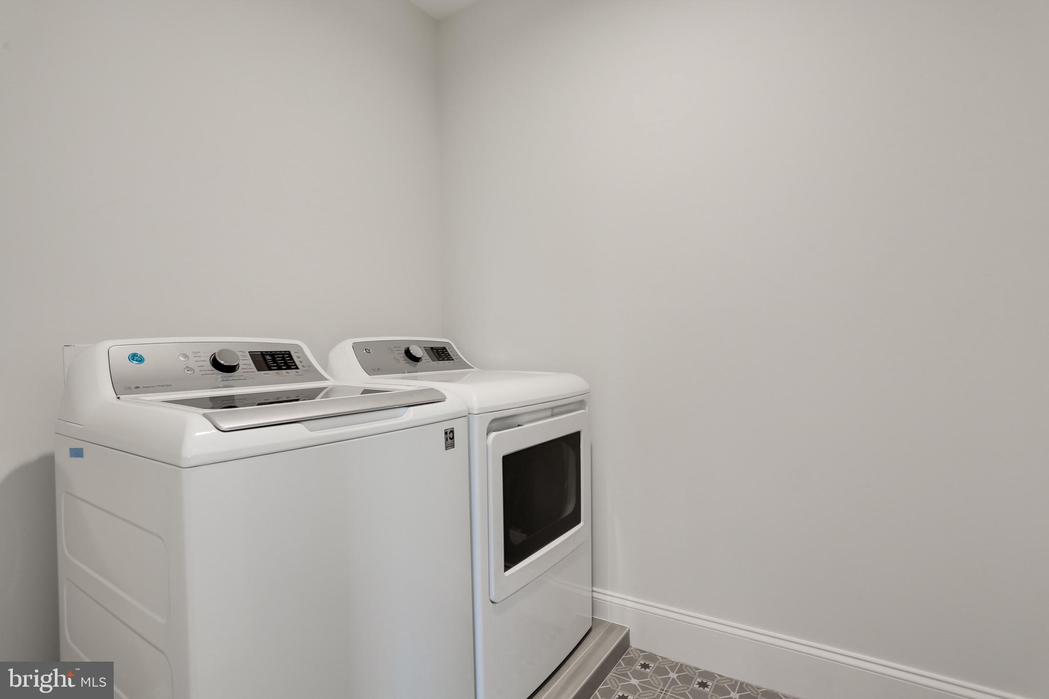 5010 25th Road North Arlington, VA 22207 - Photo 40 of 51 washer and dryer are set on raised drain