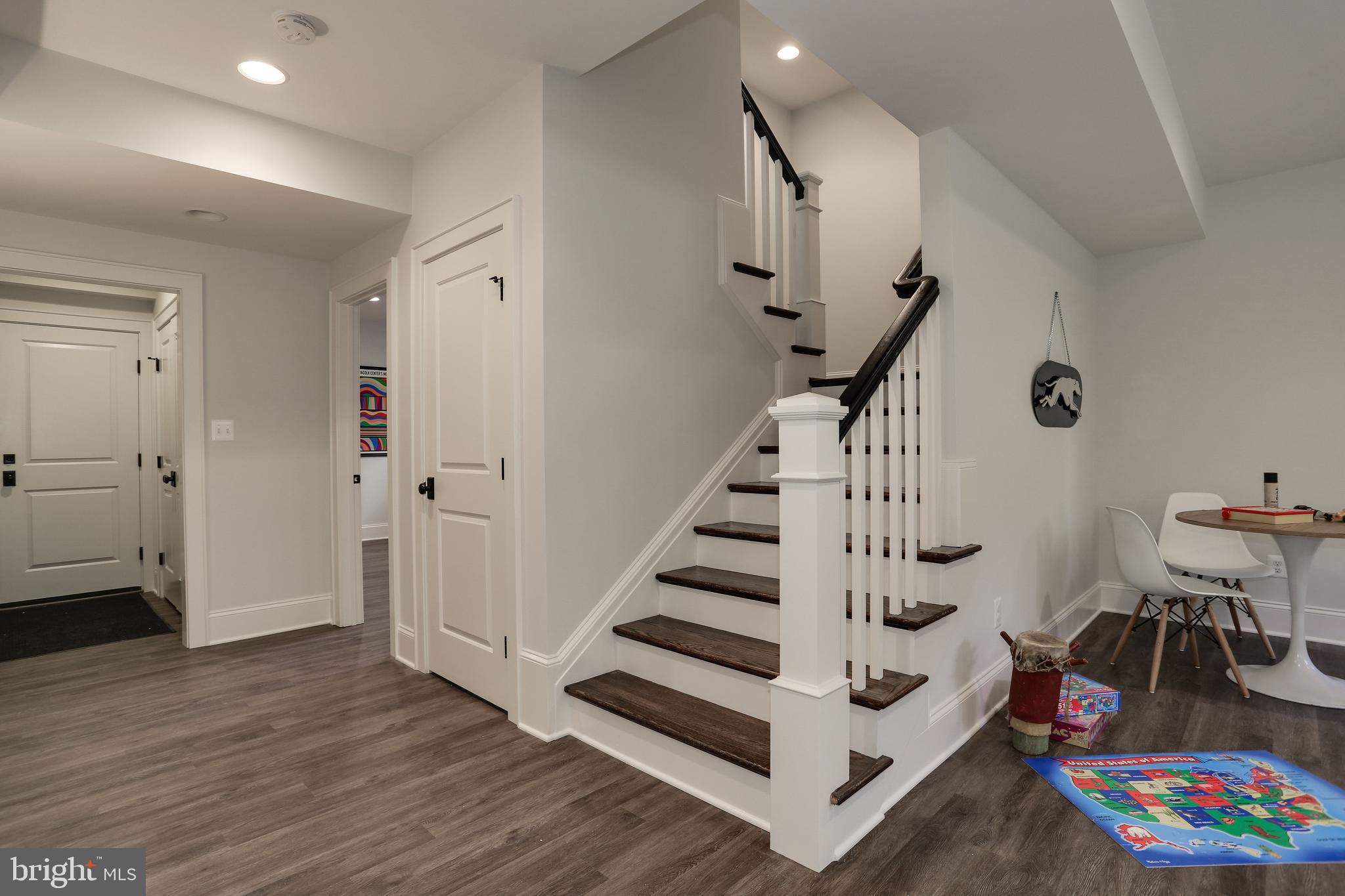 5010 25th Road North Arlington, VA 22207 - Photo 41 of 51 welcoming lower level with Coretec floors