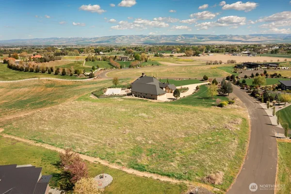 a view of an ocean and a mountain