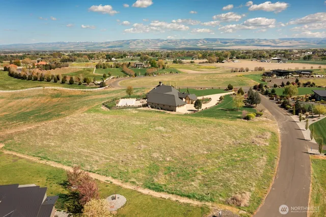 a view of an ocean and a mountain
