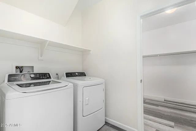 a utility room with dryer and washer