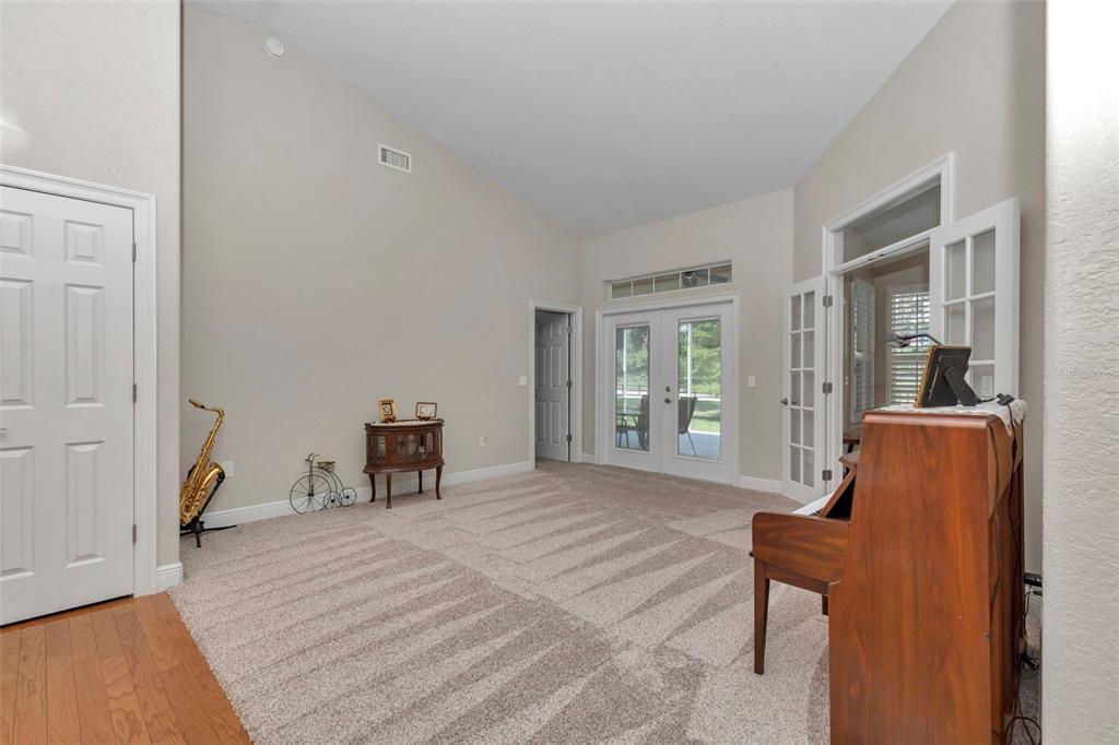 1989 Northwest 111th Loop Ocala, FL 34475 - Photo 11 of 55 a bedroom with furniture and a window