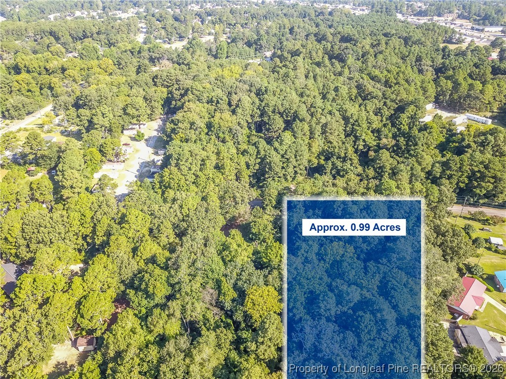 Horseshoe Road Fayetteville, NC 28303 - Photo 2 of 5 a sign broad in front of the tree