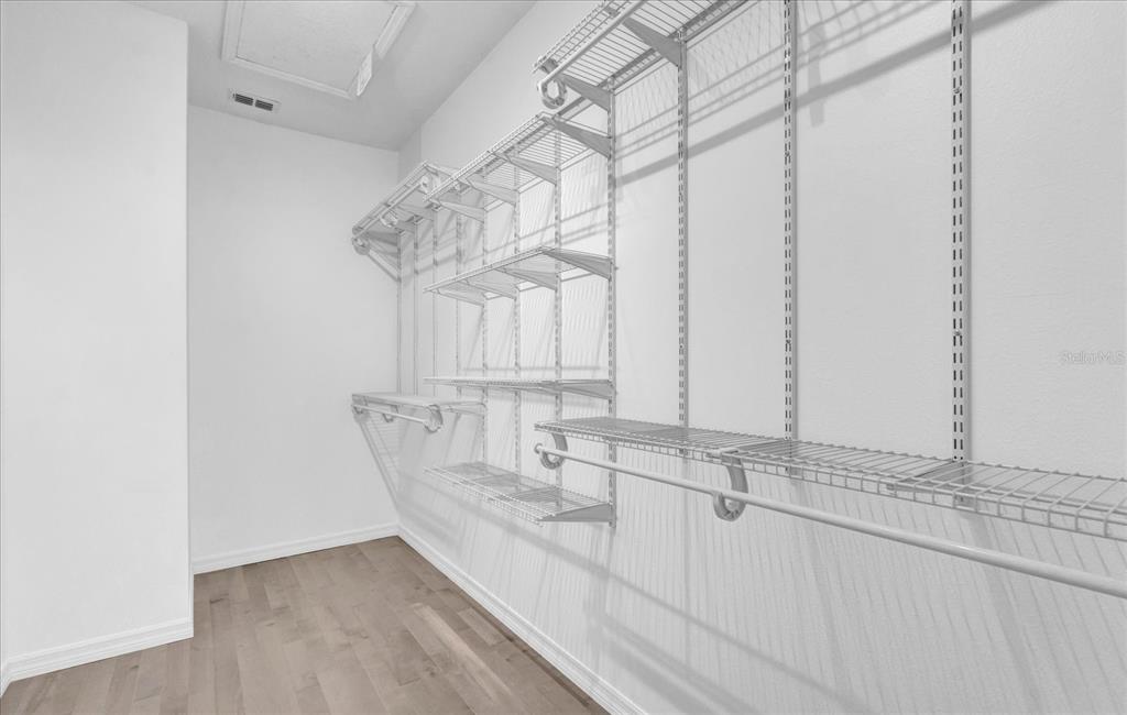 9084 Shepton Street Orlando, FL 32825 - Photo 12 of 26 a view of a kitchen with a sink and wooden floor