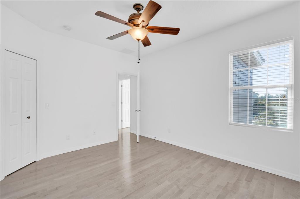 9084 Shepton Street Orlando, FL 32825 - Photo 16 of 26 a view of an empty room with a window