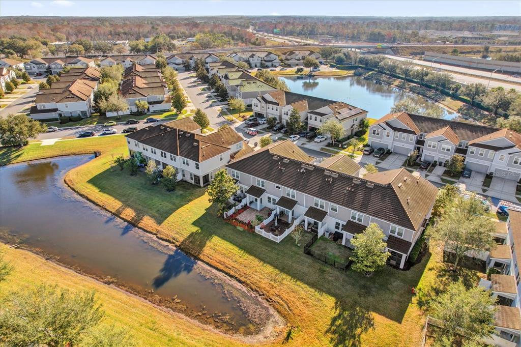 9084 Shepton Street Orlando, FL 32825 - Photo 22 of 26 an aerial view of residential houses with outdoor space